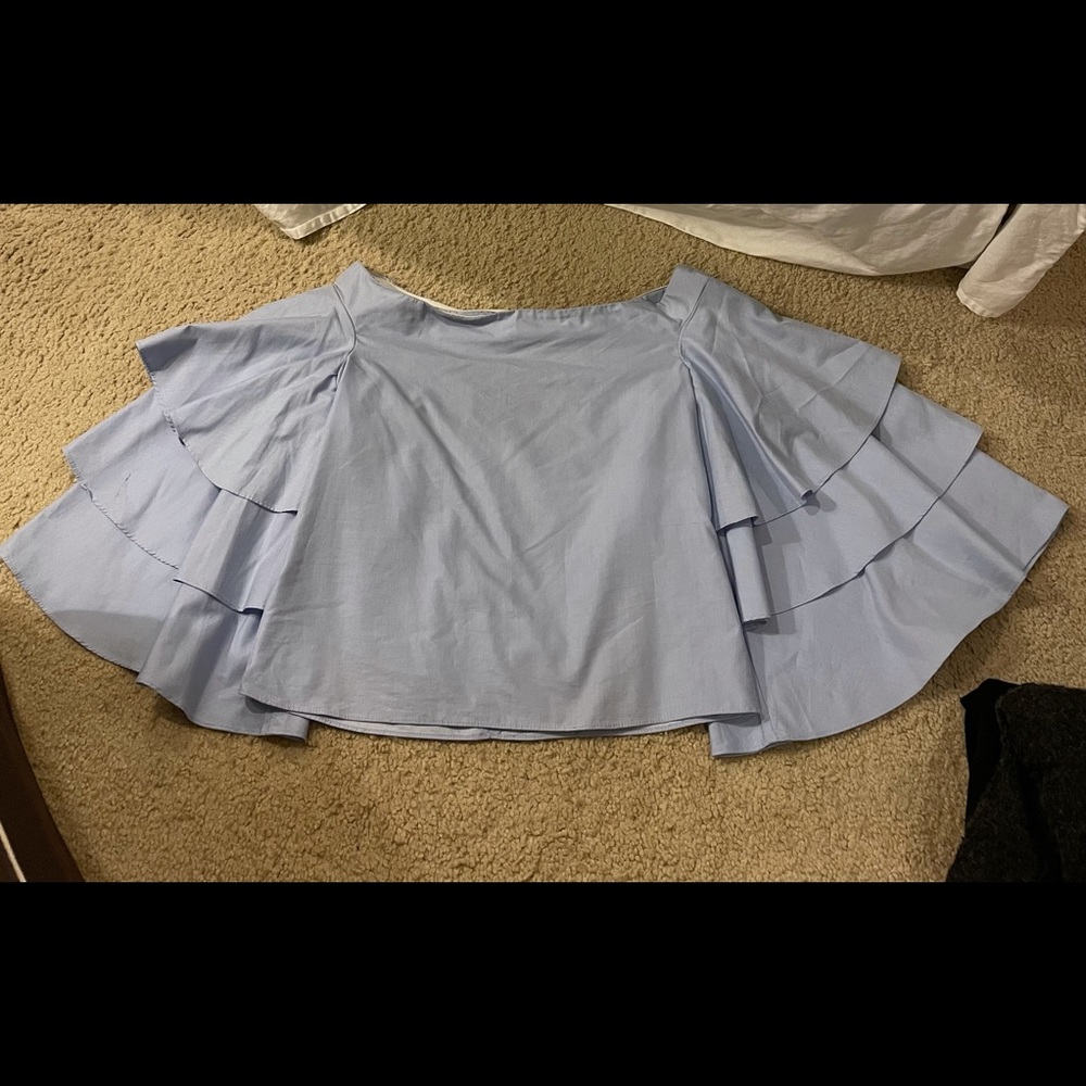Baby blue off the shoulder shirt with ruffles!